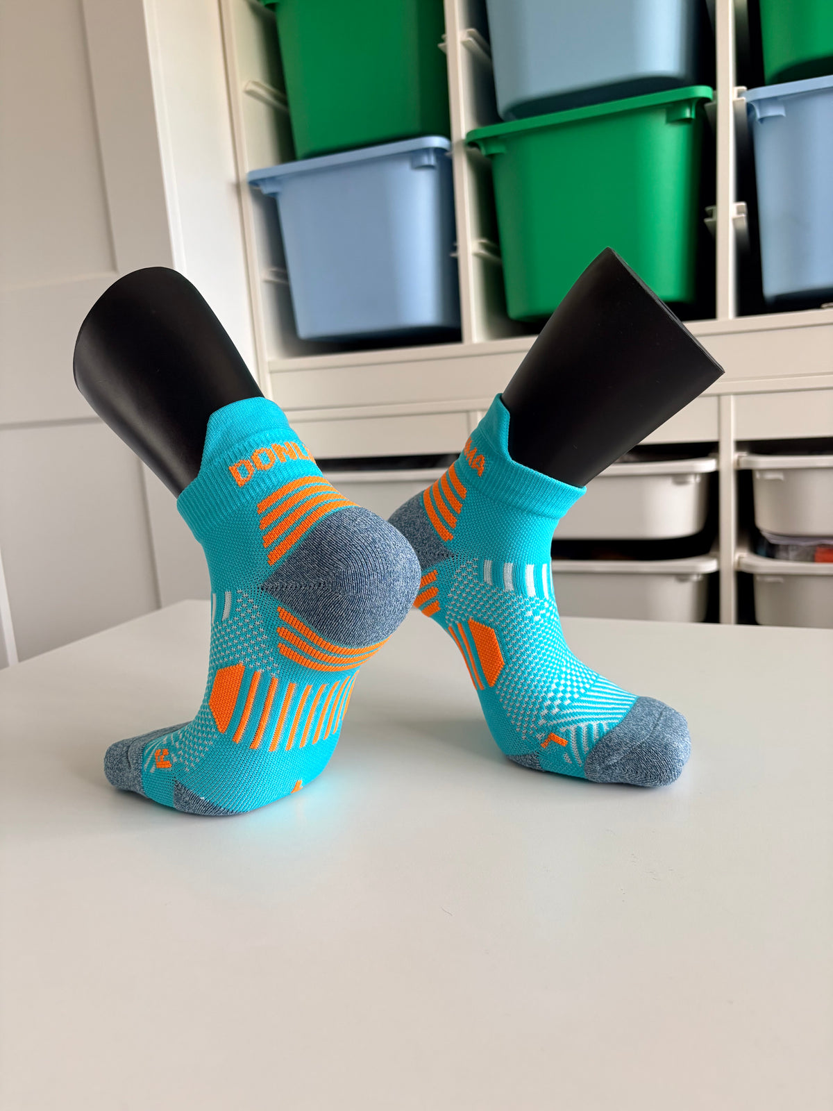 Donlima unisex ankle running socks in turquoise and orange