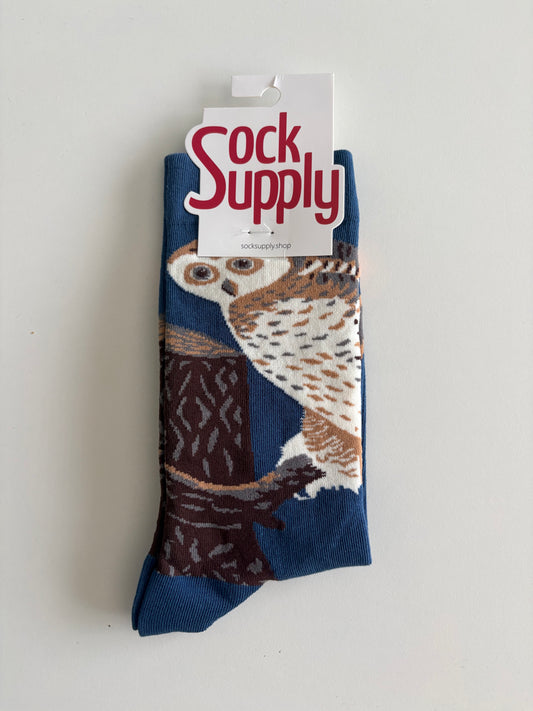 Unisex by Sock Supply. A stylised bird perched beside a tree trunk.